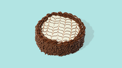 A chocolate cake with white icing.