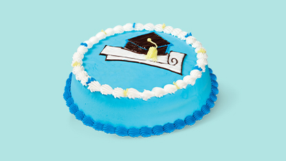Blue graduation cake with a school cap on top.